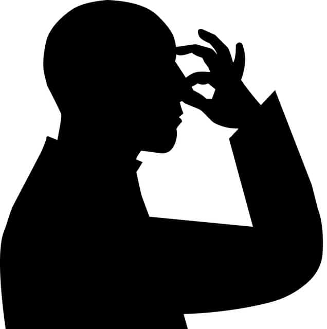 silhouette'-pinching-his-nose