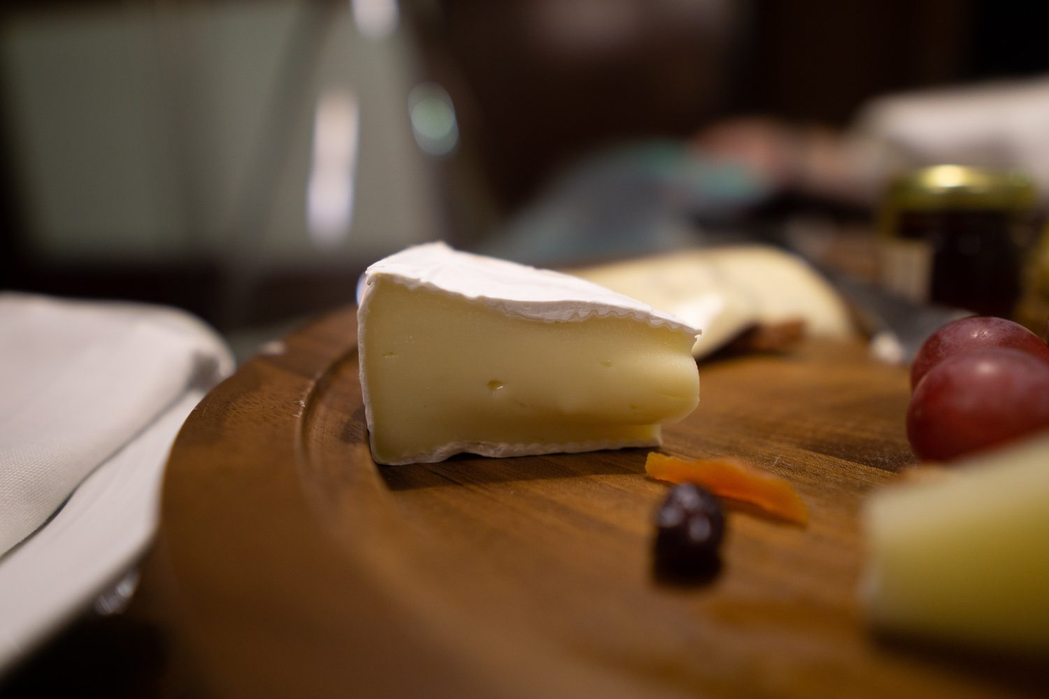 Brie cheese on cheeseboard
