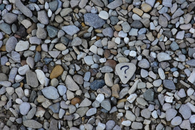 question mark in rocks