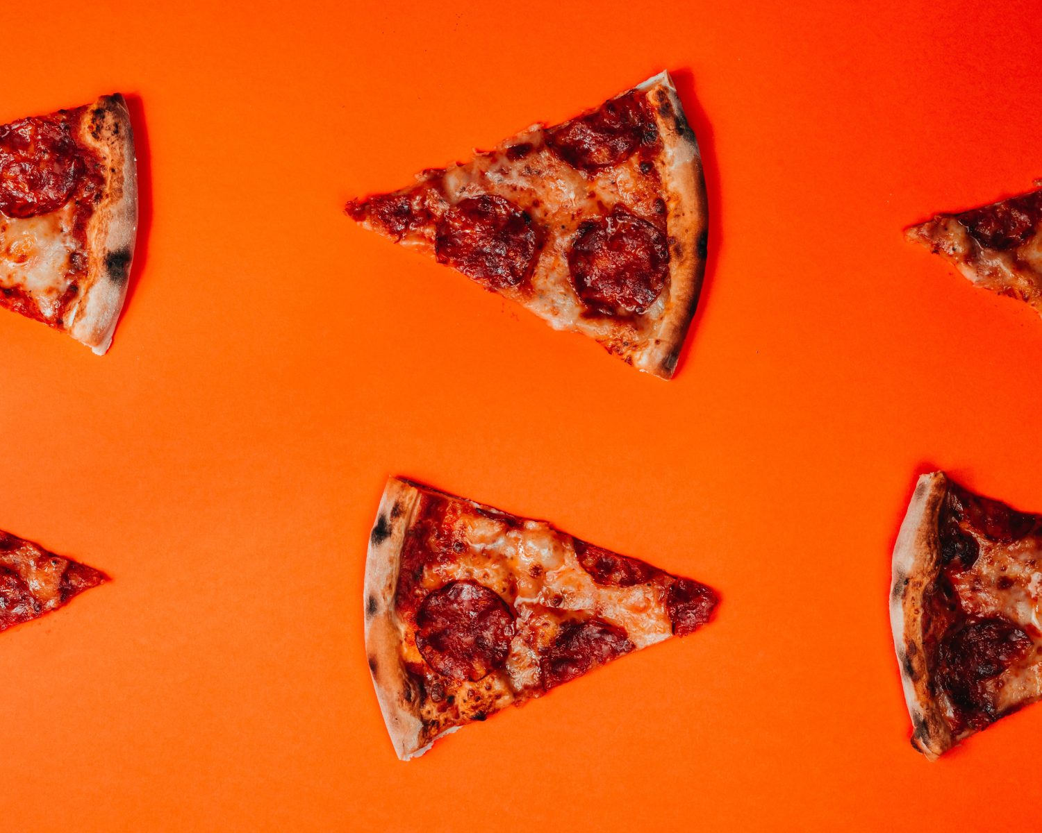 pizza-slices-orange-background