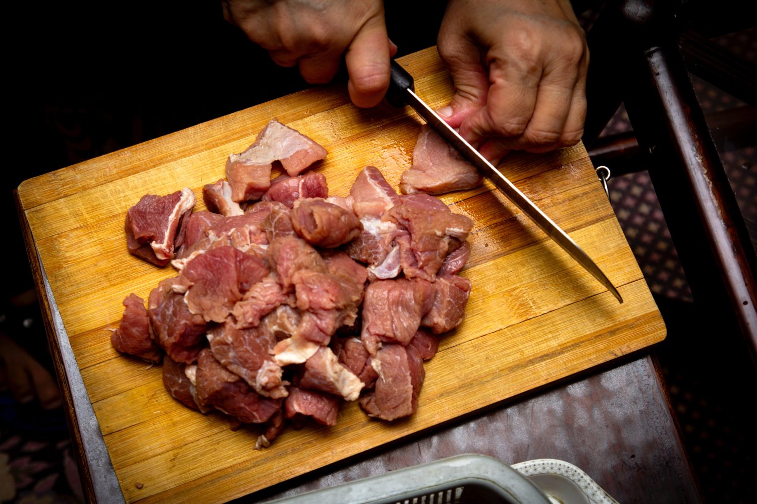 raw-pork-being-chopped