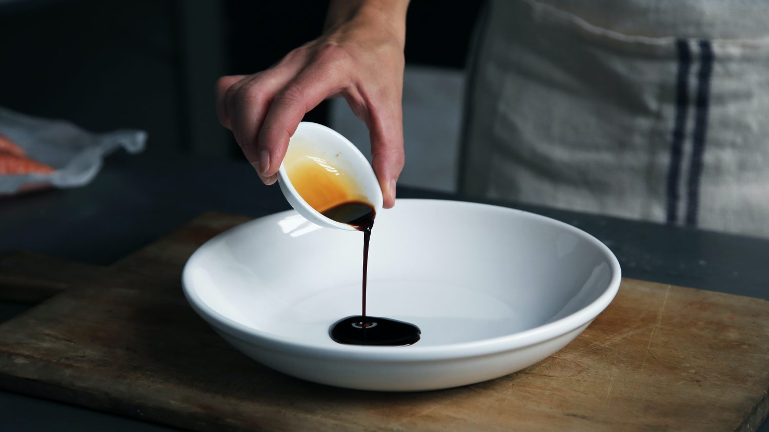 pouring-dark-brown-sauce