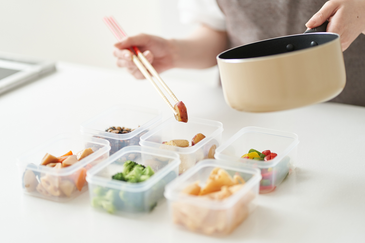 putting-food-into-tupperware-containers