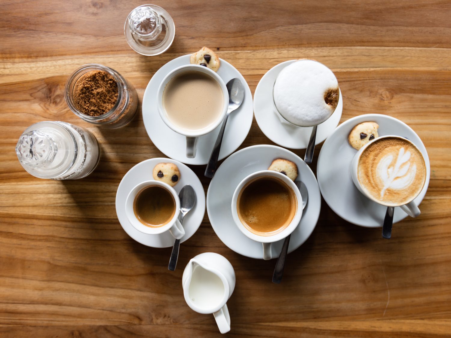 array-of-coffee-drinks-on-table