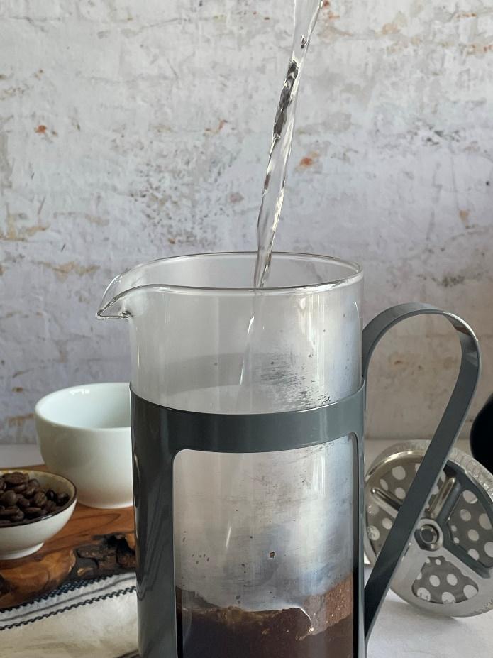 water-being-poured-into-french-press