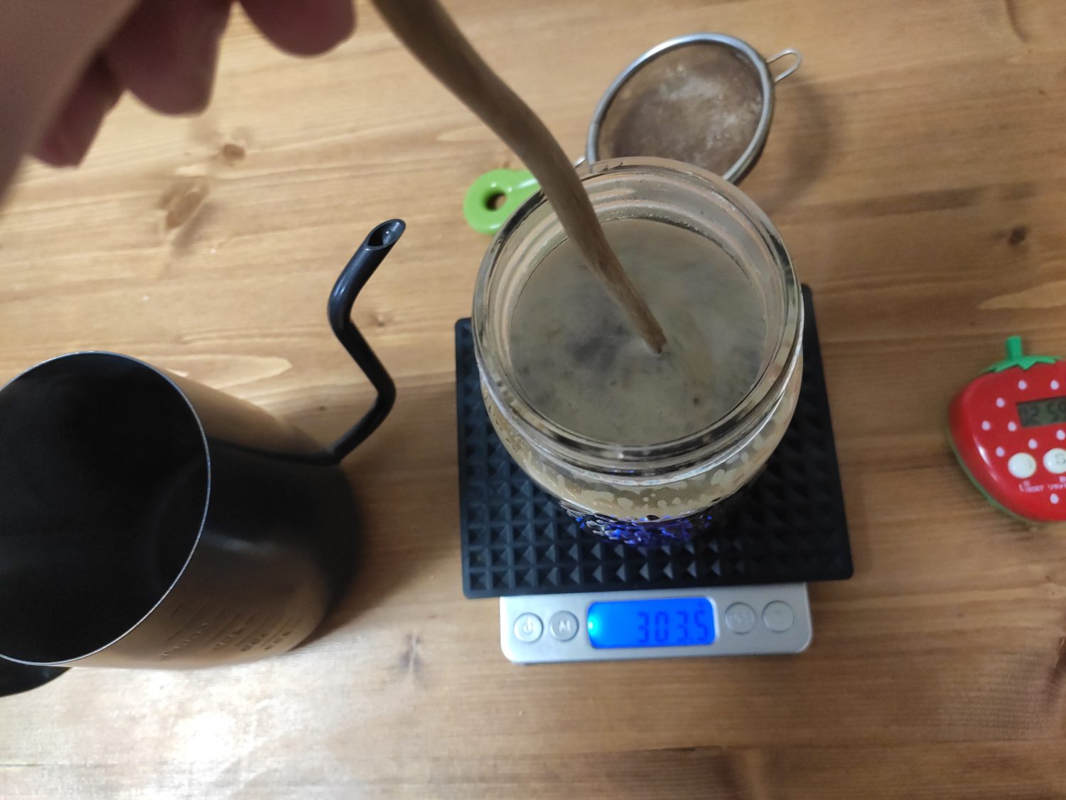 stirring-coffee-in-mason-jar